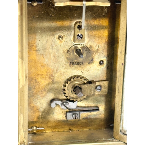 218 - A Mid/Late 19th Century French brass carriage clock. With key.