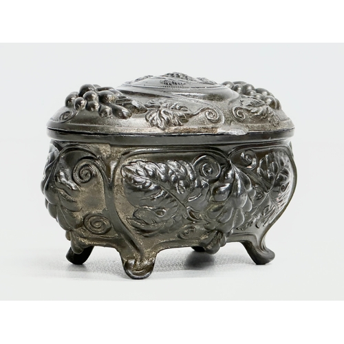 221 - An Early 20th Century Art Nouveau pewter trinket box. Circa 1900-1910. 11x7cm