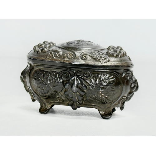 221 - An Early 20th Century Art Nouveau pewter trinket box. Circa 1900-1910. 11x7cm