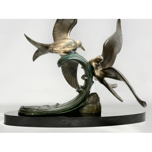 29 - A large 1920’s Art Deco ‘Paradis’ spelter figure on slate base. 47x45x50cm