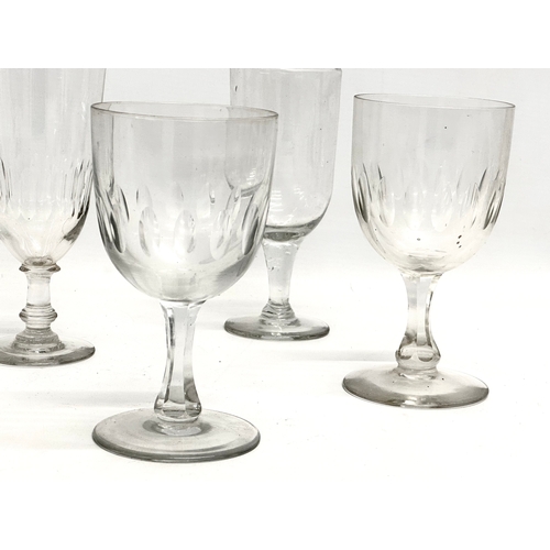 141 - A collection of large Mid 19th Century Victorian drinking glasses. 2 Victorian ale glasses 19cm. A V... 