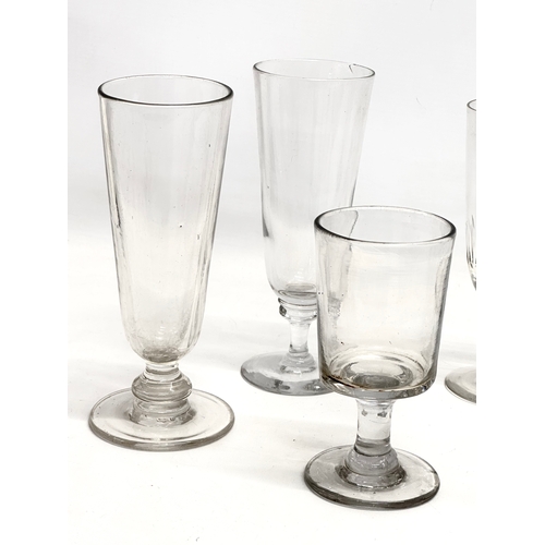 141 - A collection of large Mid 19th Century Victorian drinking glasses. 2 Victorian ale glasses 19cm. A V... 