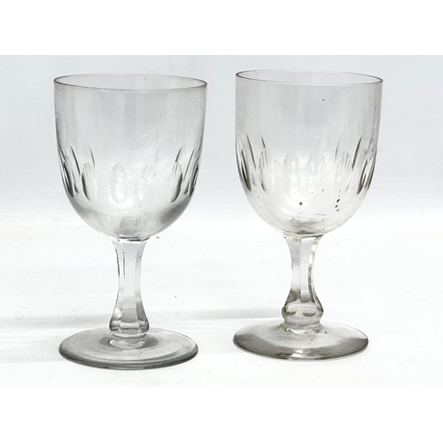 141 - A collection of large Mid 19th Century Victorian drinking glasses. 2 Victorian ale glasses 19cm. A V... 