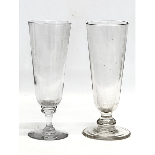 141 - A collection of large Mid 19th Century Victorian drinking glasses. 2 Victorian ale glasses 19cm. A V... 