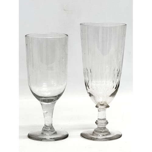 141 - A collection of large Mid 19th Century Victorian drinking glasses. 2 Victorian ale glasses 19cm. A V... 