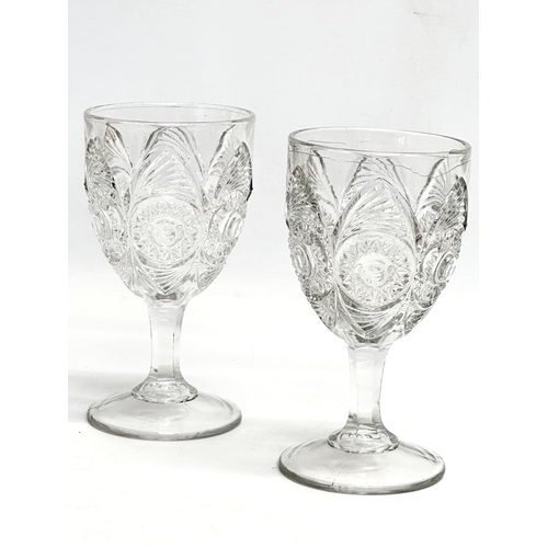 145 - 4 Late 19th and Early 20th Century cut and pressed drinking glasses. A large Victorian frosted cut g... 