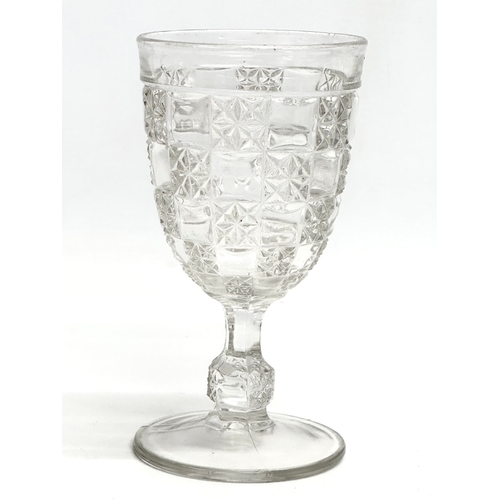 145 - 4 Late 19th and Early 20th Century cut and pressed drinking glasses. A large Victorian frosted cut g... 