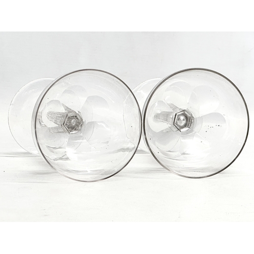 147 - Victorian champagne and wine glasses. A pair of Late 19th Century Victorian slice lens cut champagne... 