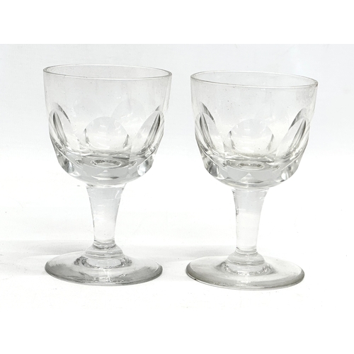 152 - 2 pairs of Victorian slice cut drinking glasses. 
Victorian wine glasses 13cm. A pair of Victorian g... 