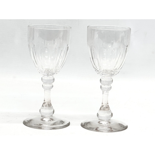 152 - 2 pairs of Victorian slice cut drinking glasses. 
Victorian wine glasses 13cm. A pair of Victorian g... 