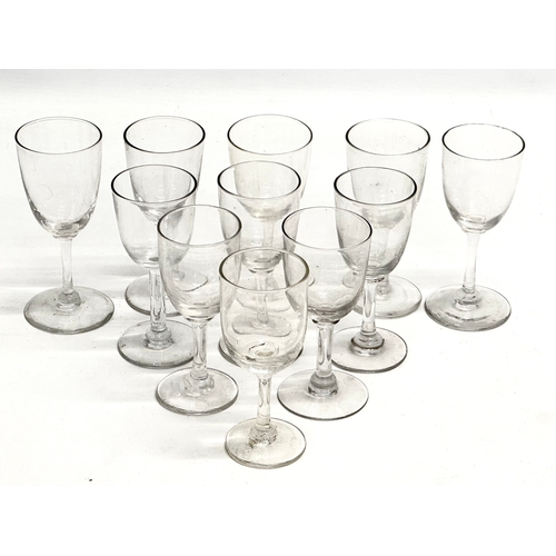 155 - A set of 11 Mid 19th Century Victorian port glasses. Circa 1850-1870. 11.5cm. 12cm