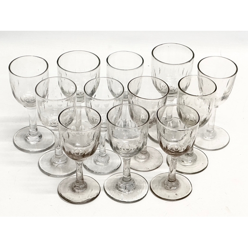 159 - A set of 12 Mid 19th Century Victorian slice cut port glasses. 12cm. 11.5cm. 11cm.