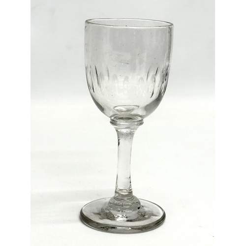 159 - A set of 12 Mid 19th Century Victorian slice cut port glasses. 12cm. 11.5cm. 11cm.