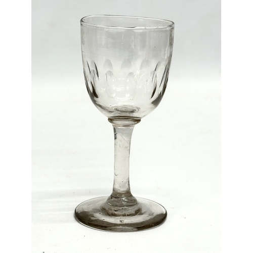 159 - A set of 12 Mid 19th Century Victorian slice cut port glasses. 12cm. 11.5cm. 11cm.