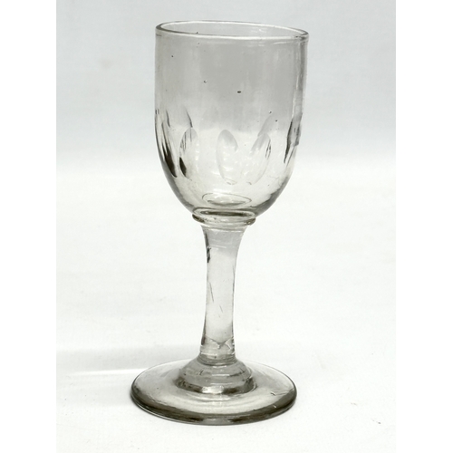 159 - A set of 12 Mid 19th Century Victorian slice cut port glasses. 12cm. 11.5cm. 11cm.