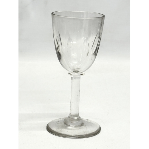 159 - A set of 12 Mid 19th Century Victorian slice cut port glasses. 12cm. 11.5cm. 11cm.