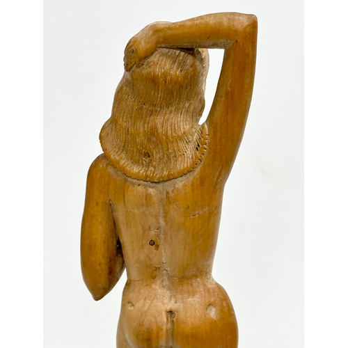 94 - 2 19th/Early 20th Century carved figurines of nude ladies. 33cm. 20cm