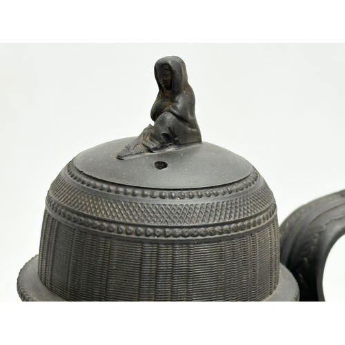 30 - 3 pieces of Late 18th/Early 19th Century black Basalt pottery. An unmarked basalt coffee pot, circa ... 