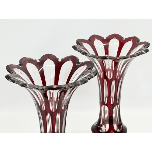 163 - A pair of Late 19th Century Bohemian Ruby glass vases/lustres. 16x28cm