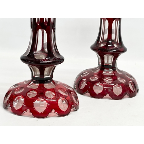 163 - A pair of Late 19th Century Bohemian Ruby glass vases/lustres. 16x28cm