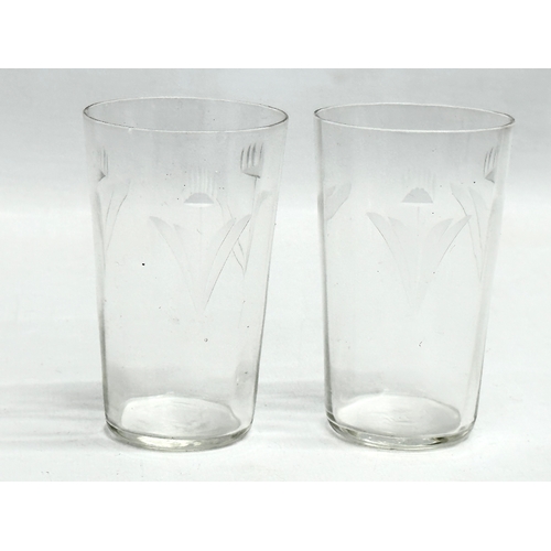 165 - A collection of Early 20th Century etched glass tumblers. 11cm