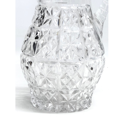 167 - A Late 19th Century Victorian cut glass water jug. Circa 1890-1900. 26cm