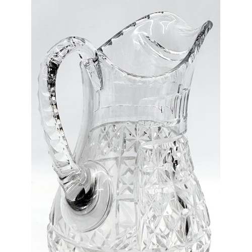 167 - A Late 19th Century Victorian cut glass water jug. Circa 1890-1900. 26cm