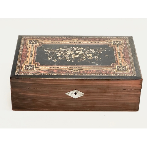 97 - A Victorian inlaid simulated rosewood writing slope. Closed 29.5x20x10cm