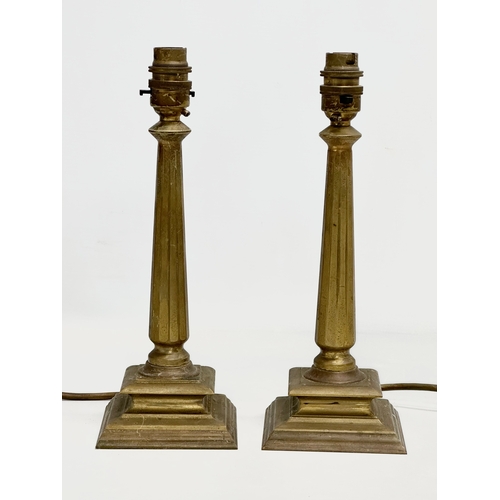 199 - A pair of vintage heavy brass table lamps. 29cm