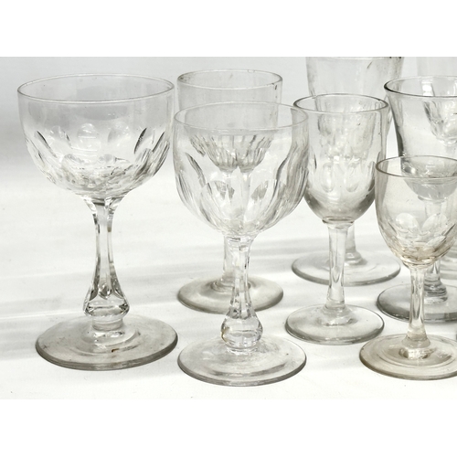 169 - A collection of Mid/Late 19th Century Victorian slice lens cut drinking glasses. 13cm. 12cm. 11cm. 8... 