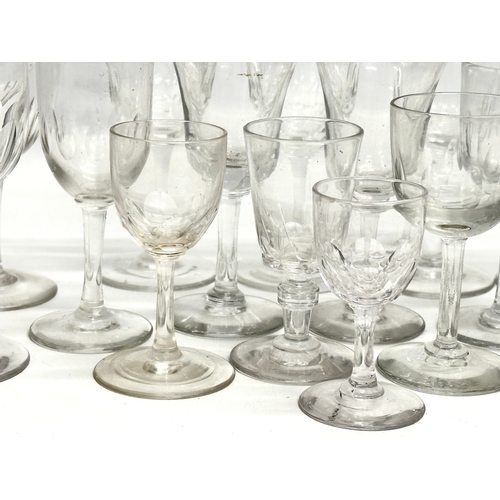 169 - A collection of Mid/Late 19th Century Victorian slice lens cut drinking glasses. 13cm. 12cm. 11cm. 8... 