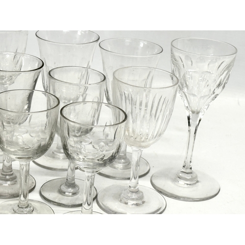 169 - A collection of Mid/Late 19th Century Victorian slice lens cut drinking glasses. 13cm. 12cm. 11cm. 8... 