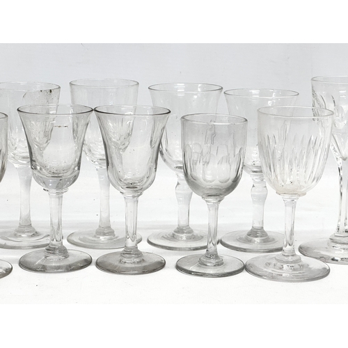 169 - A collection of Mid/Late 19th Century Victorian slice lens cut drinking glasses. 13cm. 12cm. 11cm. 8... 