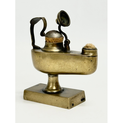 109 - A Late 19th/Early 20th Century ‘Roman Lamp’ table lighter. 9.5x10cm