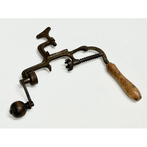 234 - 2 19th Century cartridge loader tools.