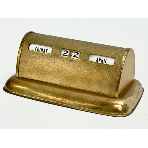 239 - 2 Early 20th Century brass calendars. Including a Booth Line Steamship Company desktop calendar.