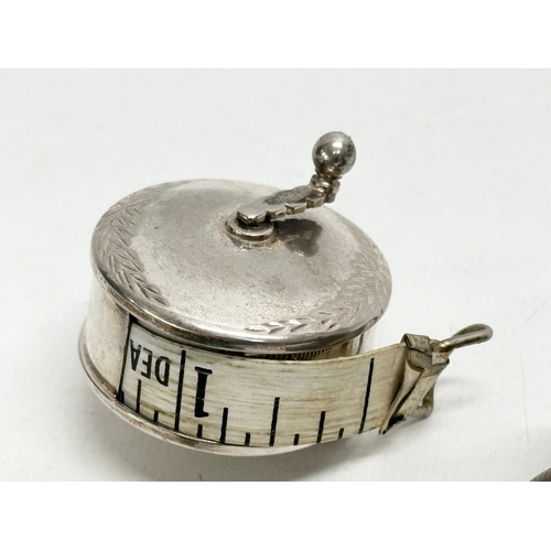 241 - 3 miniature novelty measuring tapes.