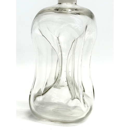 243 - A Danish Mid Century ‘Kluk Kluk’ decanter by Holmegaard. 25.5cm