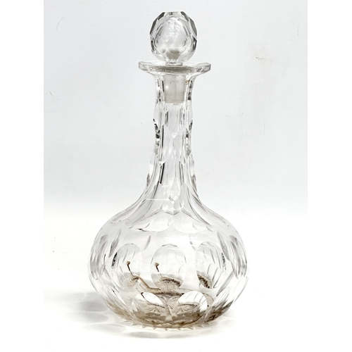 171 - 3 Mid 19th and Early 20th Century glass decanters. A large Mid 19th Century decanter 35cm.