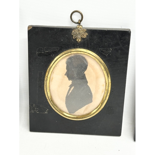 244 - A collection of Early/Mid 19th Century hand painted silhouettes.