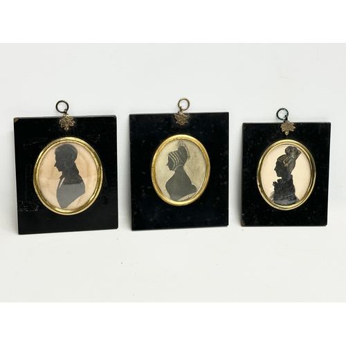 244 - A collection of Early/Mid 19th Century hand painted silhouettes.