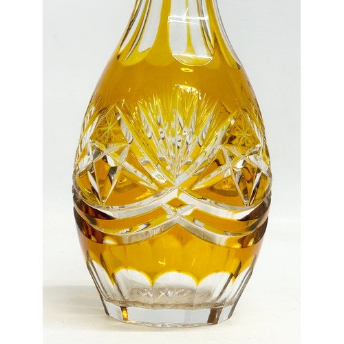 251 - A 20th Century Nachtmann stained amber glass decanter. 31cm