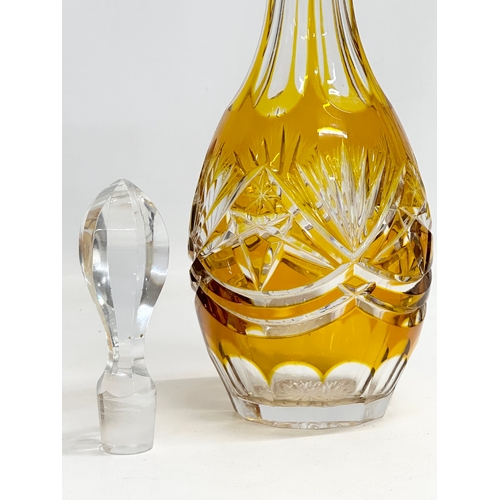 251 - A 20th Century Nachtmann stained amber glass decanter. 31cm