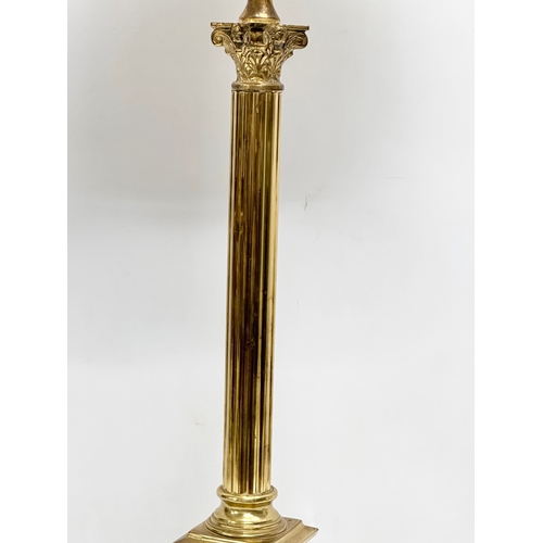 252 - A large 20th Century brass table lamp with Corinthian column. Base measures 17x17x64cm