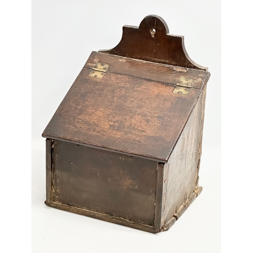 79 - A Late 18th/Early 19th Century candle box. Circa 1780-1810. 27x24x39cm