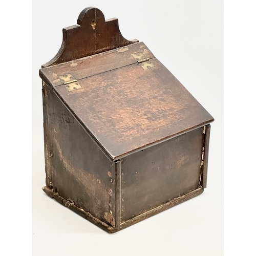 79 - A Late 18th/Early 19th Century candle box. Circa 1780-1810. 27x24x39cm