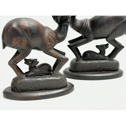 271 - A pair of Late 19th/Early 20th Century carved African Padauk deers. Circa 1900. 14x16cm