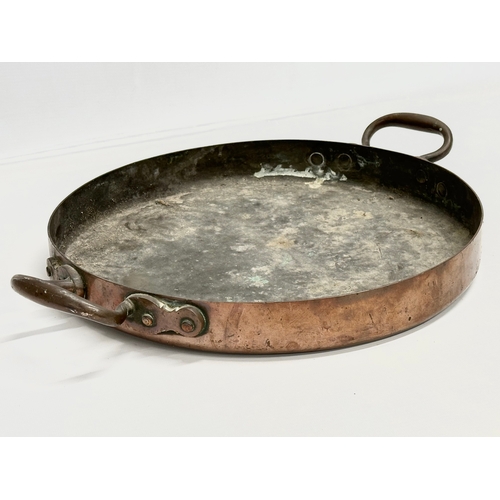 260 - A Late 19th Century Johnson & Ravey copper 2 handled pan. 49x37x7cm