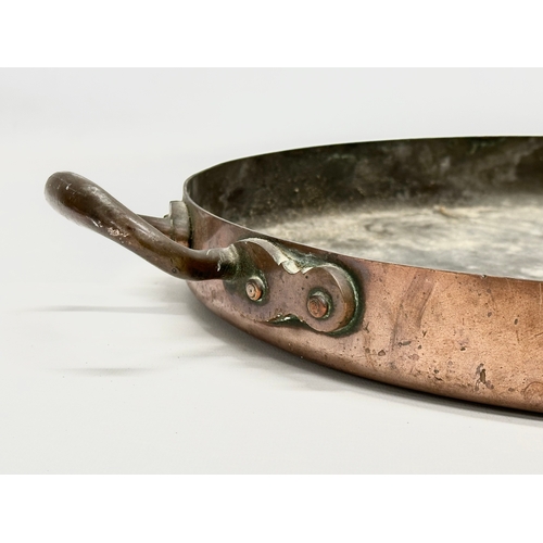 260 - A Late 19th Century Johnson & Ravey copper 2 handled pan. 49x37x7cm