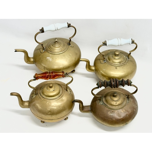 264 - 4 Victorian brass kettles.